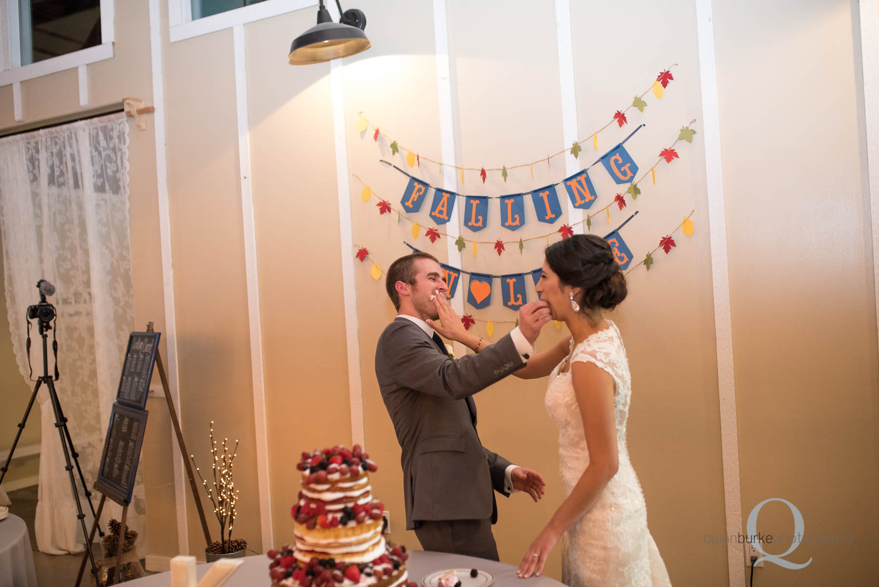 cake cutting during wedding reception Green Villa Barn